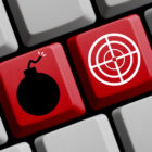 Laptop with bomb and bullseye target keys