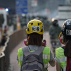 Kowloon,,Hong,Kong, Two,Women,press corps watch police crackdown